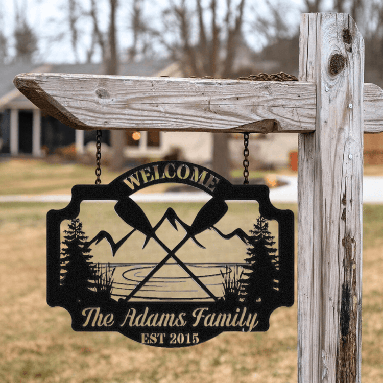 Personalized Metal Welcome Signs for Adventurers and Travelers - A Personalized metal sign with a lake design hands on a sign pole