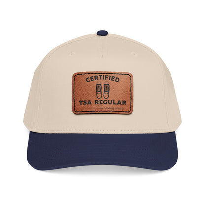 Beige and navy cap with a leather patch on a white background featuring 'Certified TSA Regular (shoes already off)'