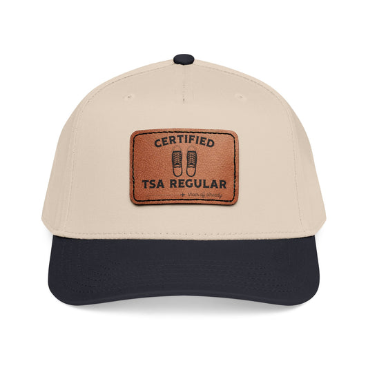 Beige and black cap with a brown leather patch featuring 'Certified TSA Regular (shoes already off)'